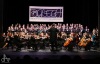 Husí kůže. Orchestru Bolech vypomohlo 50 pěvců a se ctí představili dílo Vítězslava Nováka